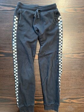 Tea Collection Black Joggers with Black-and-White Checkerboard Side Stripe